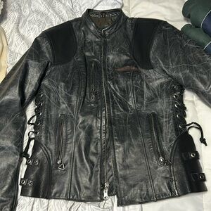 Medium women’s distressed Harley Davidson jacket